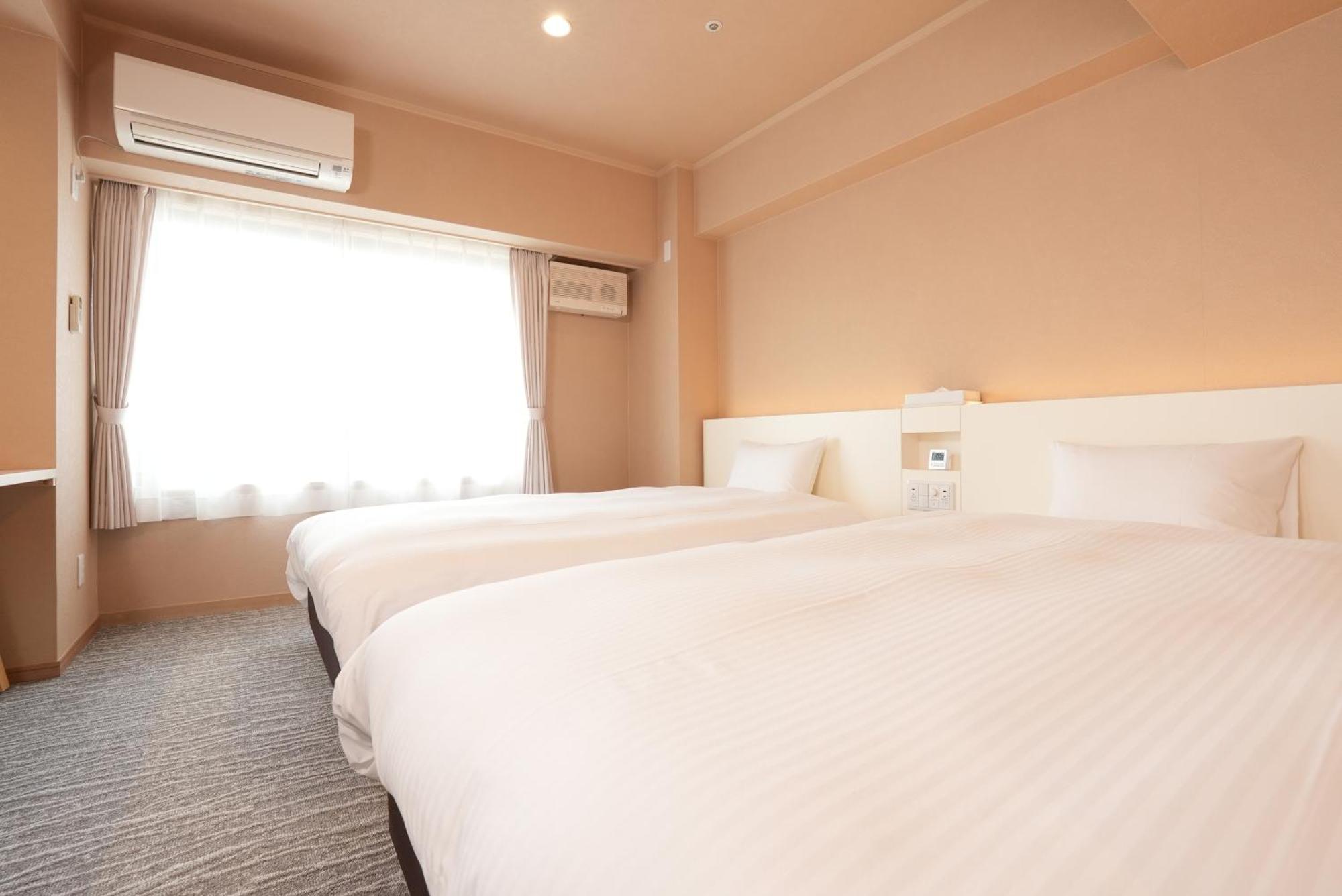 Hotel Alpha Inn Акита Экстерьер фото