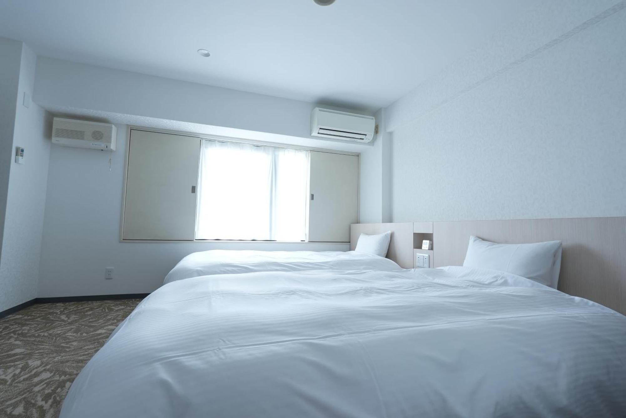 Hotel Alpha Inn Акита Экстерьер фото