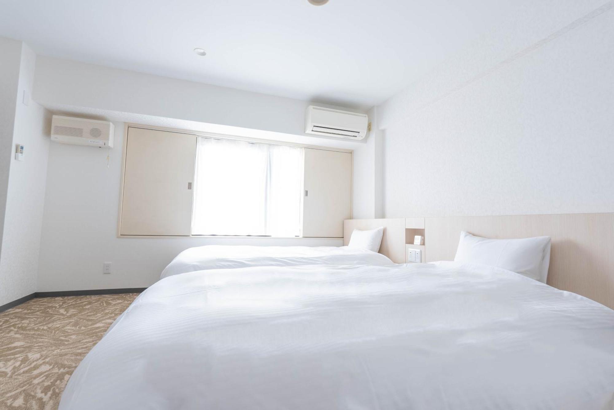 Hotel Alpha Inn Акита Экстерьер фото